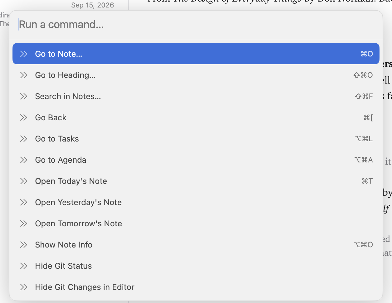 The command palette open over a note, listing commands with their shortcuts