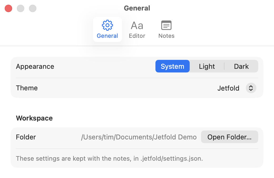 Settings → General: the Appearance switch, the Theme menu, and the Workspace folder with its Open Folder… button